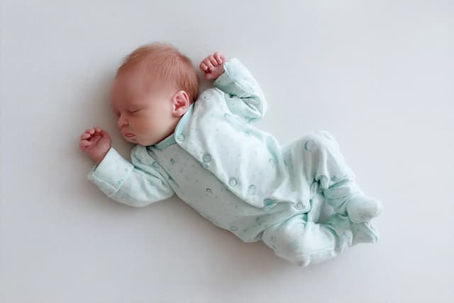 Rustgevende baby slaap